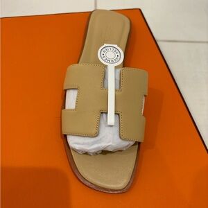 Hermes H slides in tan